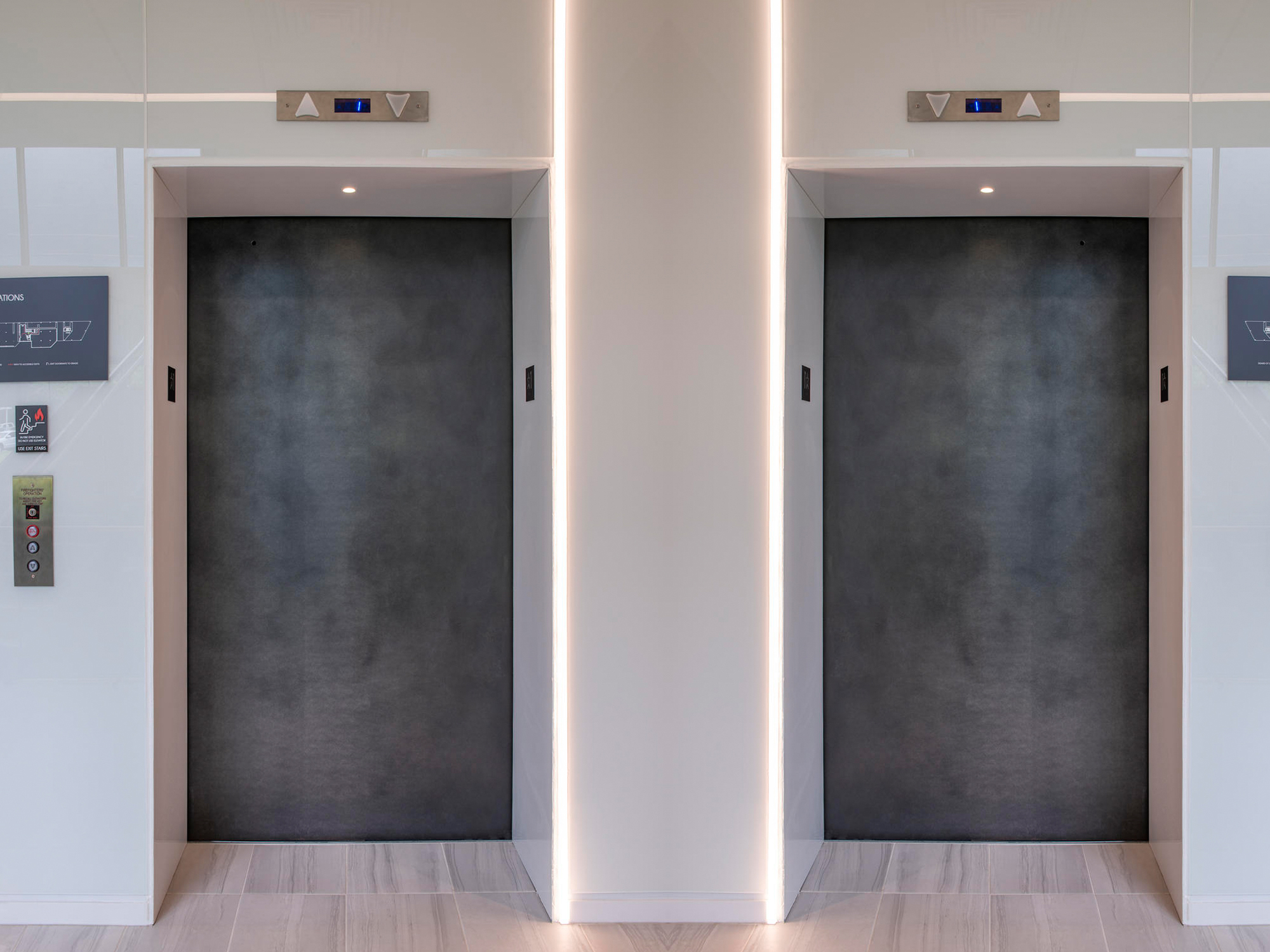 Two lift door space side by side.