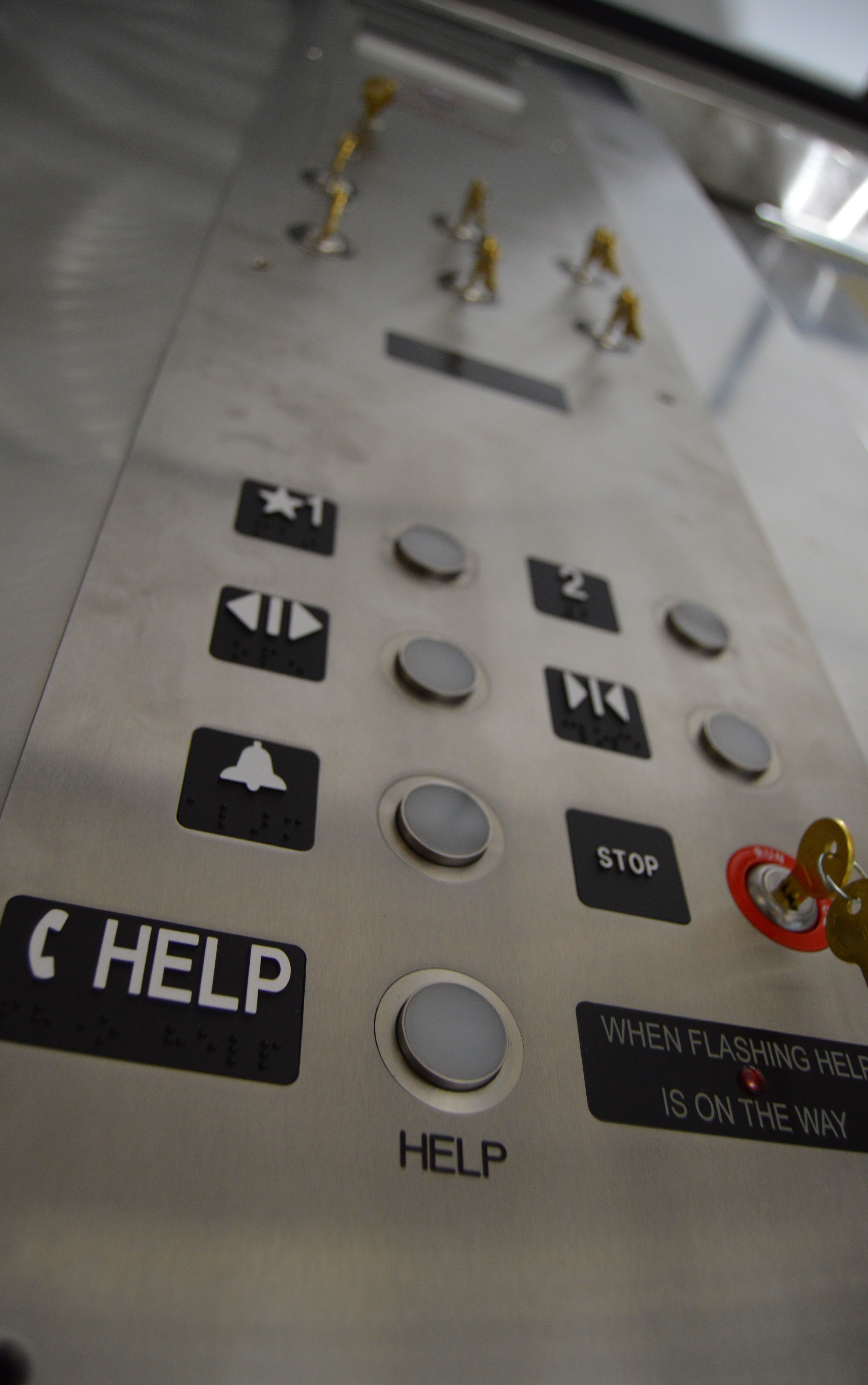 All Lift buttons and a key is inserted to the lift lock.