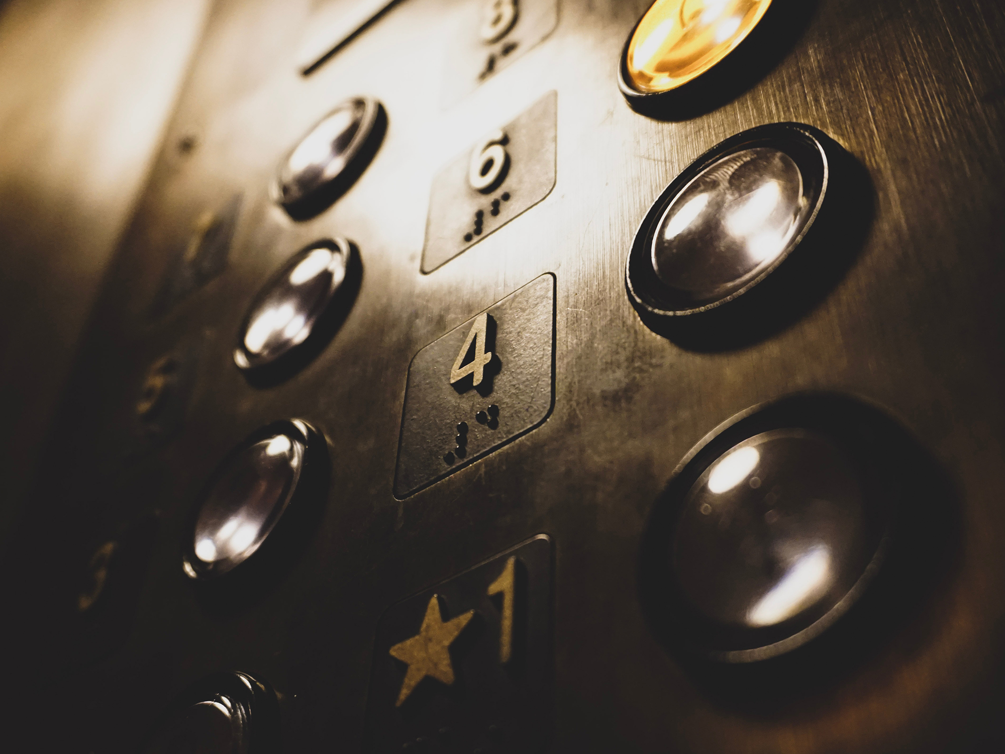 Elevator buttons showcasing number one, four and six mainly.